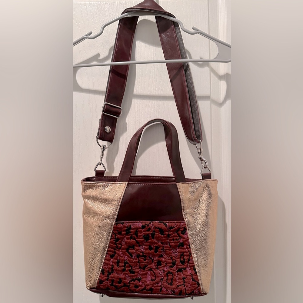 Crystalyn Kae Mini Troubadour Tote
Jacquard w Rose Gold & Wine 
Vegan Leather